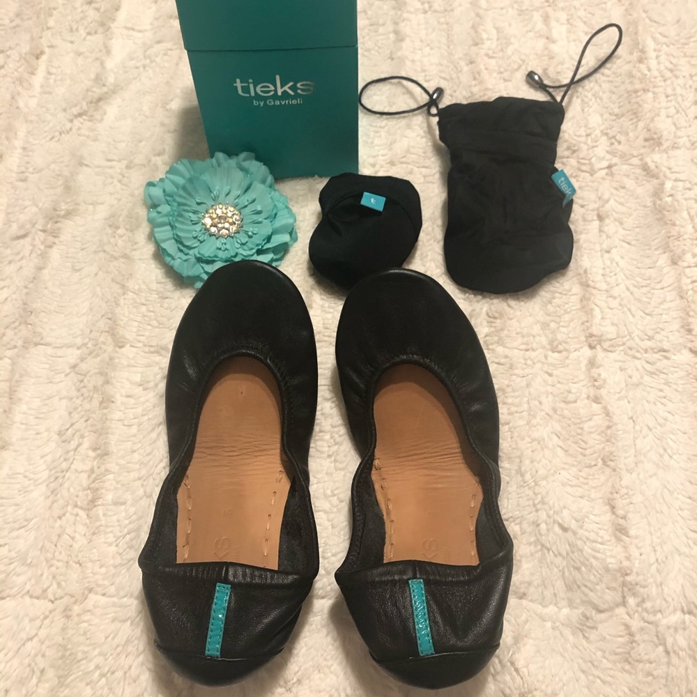 Tieks matte black classic flats.
